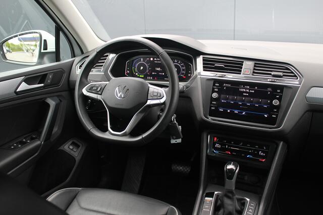 Volkswagen TIGUAN 1.4 TSI eHybrid R-Line Business+ | Incl. 12 Maanden garantie | Stoelverwarming | Stuurverwarming | Adaptieve cruise | Apple Carplay/Android Auto | Memory seats | Navigatie | Parkeersensoren | Parkeercamera | Trekhaak |