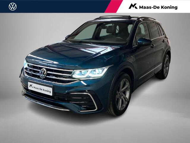 Volkswagen TIGUAN 1.4TSIeHybrid 180kW/245PK R-Line DSG · Panoramadak · Trekhaak · 360°Camera + Parkeersensoren · Garantie t/m 19-06-2026 of 60000km.