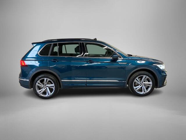 Volkswagen TIGUAN 1.4TSIeHybrid 180kW/245PK R-Line DSG · Panoramadak · Trekhaak · 360°Camera + Parkeersensoren · Garantie t/m 19-06-2026 of 60000km.
