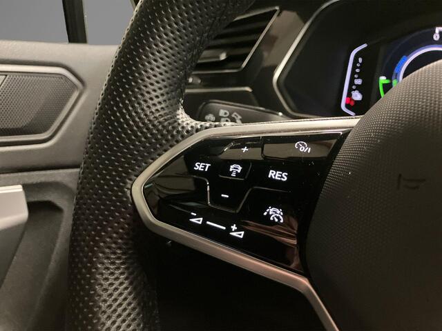 Volkswagen TIGUAN 1.4TSIeHybrid 180kW/245PK R-Line DSG · Panoramadak · Trekhaak · 360°Camera + Parkeersensoren · Garantie t/m 19-06-2026 of 60000km.