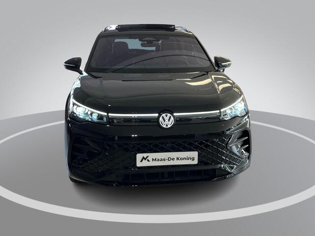 Volkswagen TIGUAN 1.5eHybrid 200kW/272PK R-Line Black Style · Panoramadak · Leder · Trekhaak · Navigatie · Garantie t/m 09-09-2030 of 100000km.