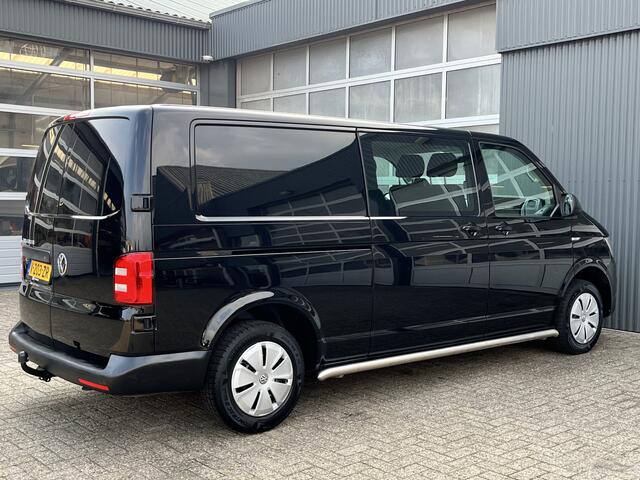 Volkswagen TRANSPORTER 2.0 TDI L2H1 DC 150pk Airco Cruise controle Telefoonverbinding Trekhaak 2500kg trekgewicht Navigatiesysteem schuifdeur Euro 6 DC 1e eigenaar Dealer onderhouden