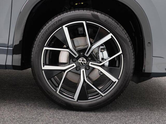 Volkswagen Tayron R-Line-Edition 1.5 eTSI 150 pk | 7 Persoons | Harman Kardon | 360 Camera | Elektrische Achterklep | Verwarmbare Voorstoelen | Massagefunctie Voor |