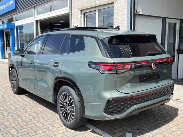 Volkswagen Tayron 1.5 eHybrid R-Line / AUTOMAAT/ 272 PK/ GARANTIE TM 7-2030/ TREKHAAK/ PANO/ BLACK STYLE/ 360 CAMERA/ CRUISE/ NAVI/ APP-CONNECT/ STOELVERWARMING/ 20" LMV