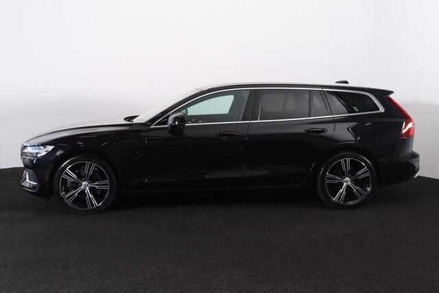 Volvo V60 T6 Recharge AWD Inscription - IntelliSafe Assist - Harman/Kardon audio - Adaptieve LED koplampen - Parkeercamera achter - Verwarmde voorstoelen & stuur - Parkeersensoren voor & achter - Elektr. bedienb. voorstoelen met geheugen - Extra getint glas - 19' L