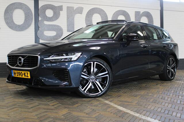 Volvo V60 2.0 T8 Polestar Engineered AWD R-Design | Incl. 12 maanden garantie | Schuif/kantel dak | Harman/Kardon | Trekhaak | Adaptieve cruise control | Stoelverwarming voor + achter | Stuurverwarming | Head-up display |