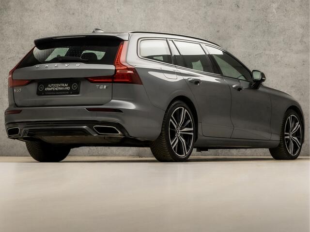 Volvo V60 2.0 T8 Twin Engine AWD R-Design 391Pk Automaat (PANORAMADAK, MEMORY SEATS, LEDER, STOELVERWARMING/KOELING, KEYLESS, SPORTSTOELEN, ZWART HEMEL, ADAPTIVE CRUISE, DRIVE MODE, NIEUWSTAAT)