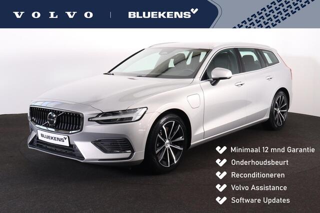 Volvo V60 T6 Recharge AWD Essential Bright - IntelliSafe Assist & Surround - Parkeercamera achter - Verwarmde voorstoelen, stuur & achterbank - Parkeersensoren voor & achter - Inklapbare trekhaak - 18' LMV