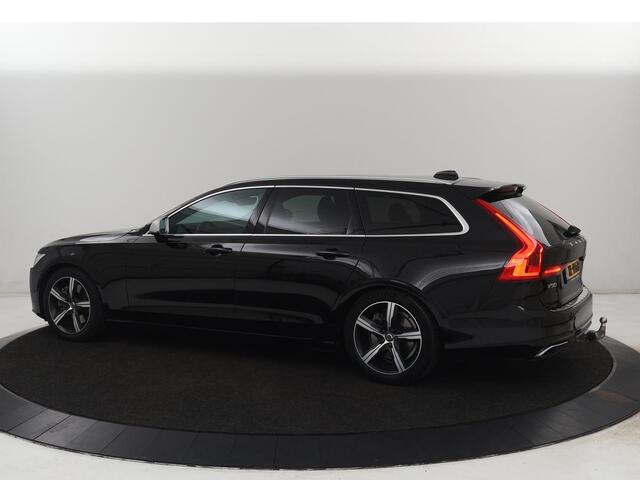 Volvo V90 2.0 T4 R-Design | Trekhaak | Leder/Alcantara | Stoelverwarming | Adaptive cruise | Camera | Carplay | Keyless | Side Assist | Navigatie | Climate control | Sportstoelen | Getint glas