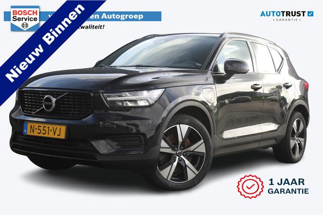 Volvo XC40 1.5 T4 Recharge R-Design | Incl. 12 maanden garantie | Harman/Kardon audio | Schuif/kantel dak | Apple carplay/Android auto | Stuurwiel verwarming | Voorstoelen verwarmd | DAB | Navigatie | Lichtmetalen velgen | Climate control | Zwart dakhemel