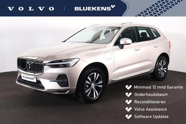 Volvo XC60 T6 Plug-in hybrid AWD Essential Edition Bright Panorama/schuifdak - IntelliSafe Assist - Parkeercamera achter - Verwarmde voorstoelen, stuur & achterbank - Parkeersensoren voor & achter - Draadloze tel. lader - Standkachel - Elektr. inklapbare trekhaak - 